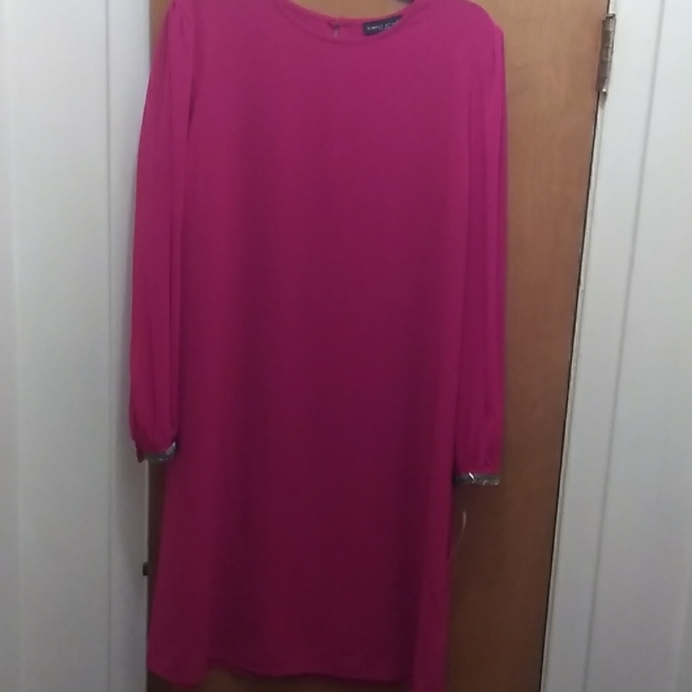 Simply styled pink dress with sheer sleeves